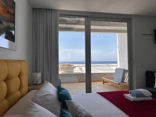 Postel nebo postele na pokoji v ubytování Calatabarca B&B