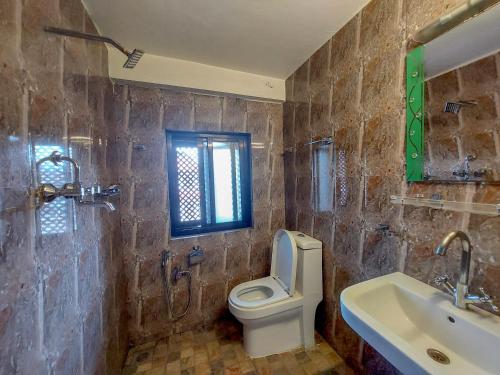 Koupelna v ubytování Hotel Garuda
