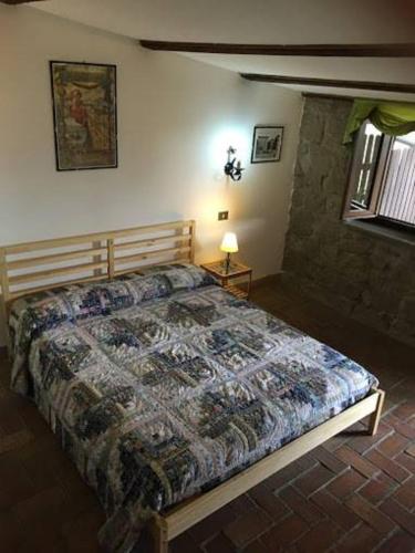 Cama o camas de una habitación en Agriturismo Monte Due Torri