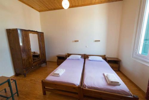 Postel nebo postele na pokoji v ubytování Hotel Patrai