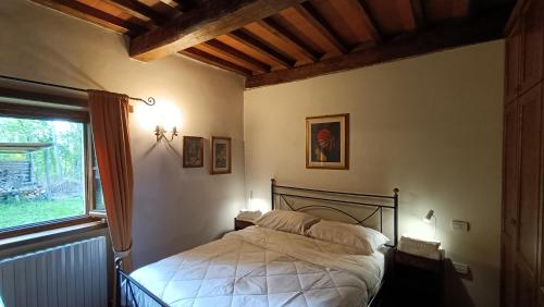 Ένα ή περισσότερα κρεβάτια σε δωμάτιο στο GreenView - CasaVacanza