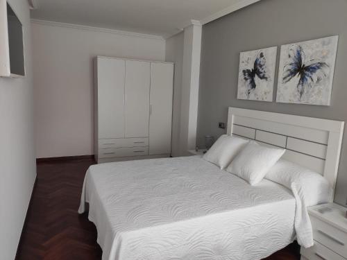 Una cama o camas en una habitación de SOLPOR
