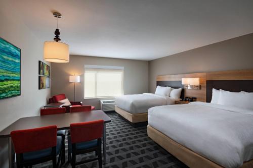 Кровать или кровати в номере TownePlace Suites San Antonio Northwest at The RIM