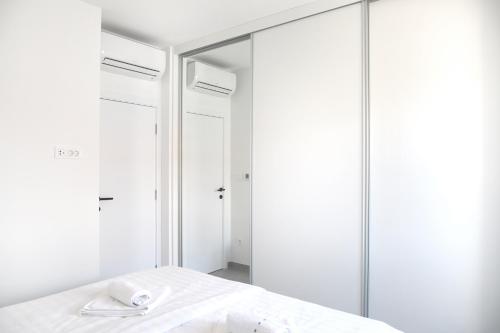 Apartments Terra Sun with Private Pool or Jacuzziにあるベッド