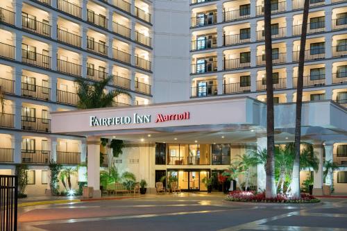 a building with a sign that reads embassy inn amariatown at Fairfield by Marriott Anaheim Resort in Anaheim