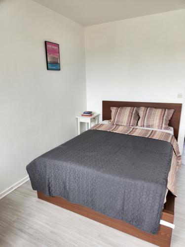 Postel nebo postele na pokoji v ubytování Chambre privée indépendante