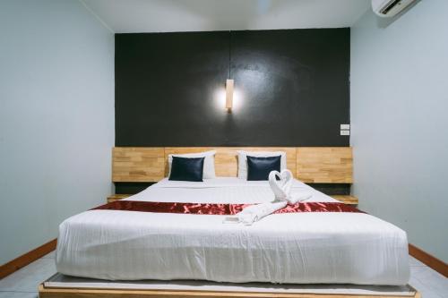 Postel nebo postele na pokoji v ubytování Jintana Resort