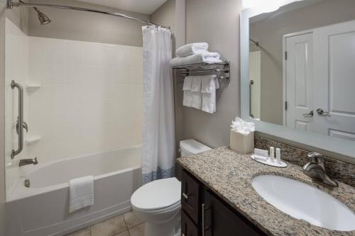 a bathroom with a sink and a toilet and a shower at TownePlace Suites Columbia Southeast / Fort Jackson in Columbia