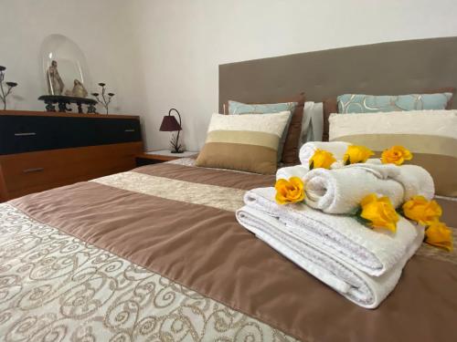 Ένα ή περισσότερα κρεβάτια σε δωμάτιο στο Vila dos M´s