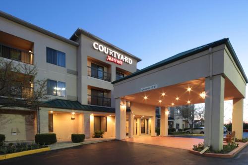 a rendering of a hotel with a building at Courtyard by Marriott Dayton North in Dayton