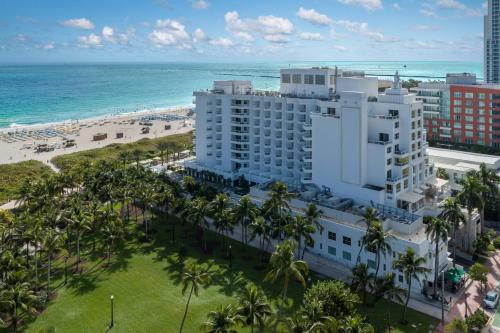 an aerial view of a hotel and the beach at Marriott Stanton South Beach in Miami Beach