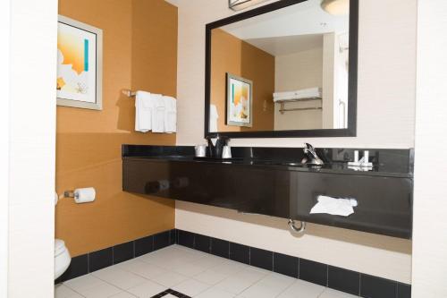 a bathroom with a black sink and a mirror at Fairfield Inn by Marriott Morgantown in Morgantown