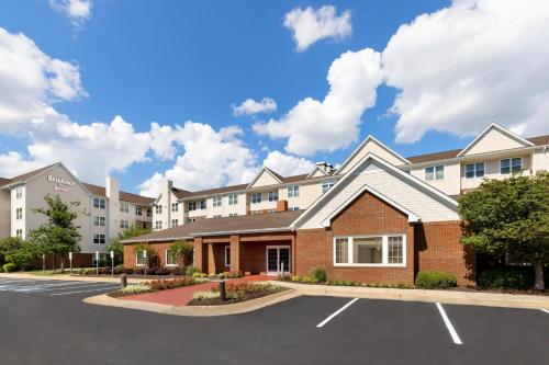 a rendering of a hotel with a parking lot at Residence Inn Potomac Mills Woodbridge in Woodbridge