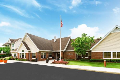 an image of a house with an american flag at Residence Inn Philadelphia/Montgomeryville in North Wales