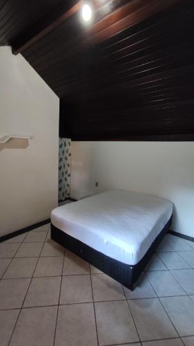 Un pat sau paturi într-o cameră la Cabelera's House