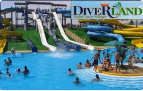 a group of people in a water park at Fior di sole in Maracalagonis