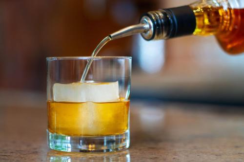 a beer being poured into a glass on a table at Residence Inn by Marriott Breckenridge in Breckenridge