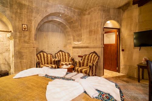 Μια τηλεόραση ή/και κέντρο ψυχαγωγίας στο Cappadocia inans Cave & Swimming Pool Hot