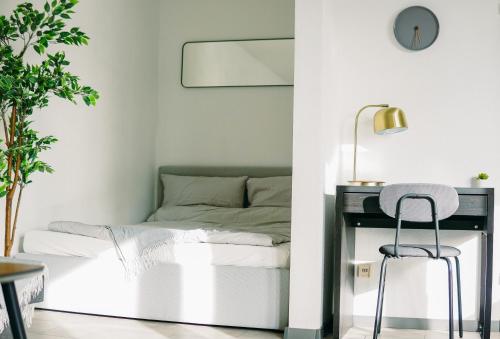 Postel nebo postele na pokoji v ubytování Nespresso Netflix Work Appartment