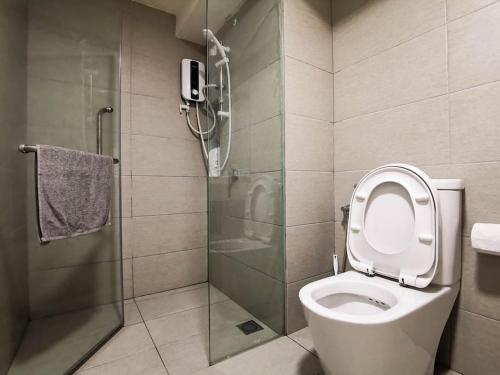 a bathroom with a shower and a toilet and a shower at EkoCheras Loft 5 pax, #Snooker #AboveMall #Balcony #FreeCarPark in Kuala Lumpur
