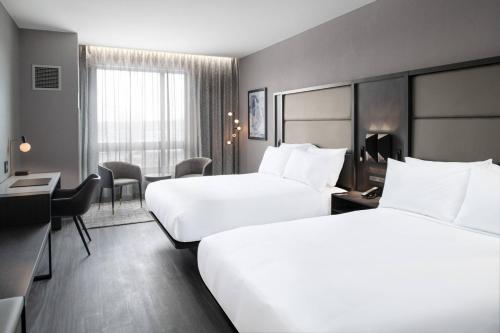 Katil atau katil-katil dalam bilik di AC Hotel by Marriott Portsmouth Downtown/Waterfront