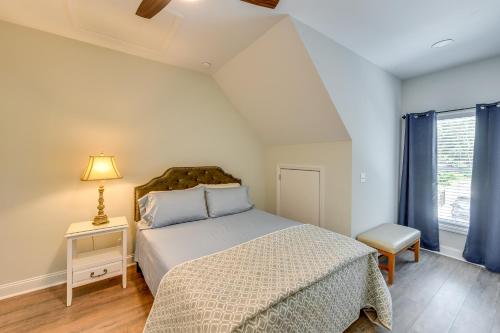 a bedroom with a bed and a lamp and a window at Bluffton Vacation Rental - 4 Mi to Tanger Outlets! in Bluffton