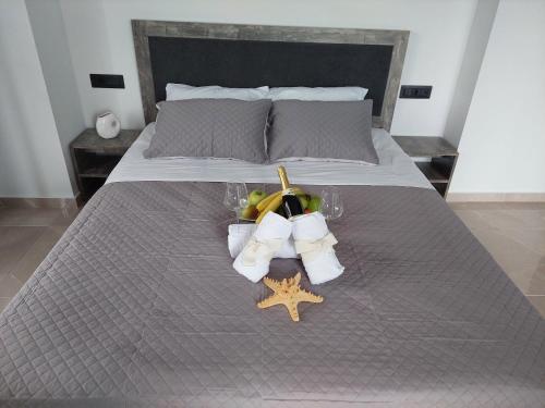 Letto o letti in una camera di Luana Monte Apartments