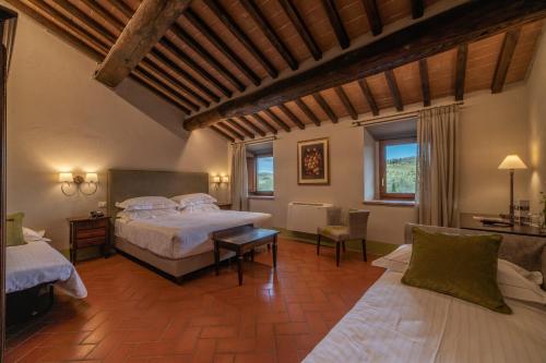 Posteľ alebo postele v izbe v ubytovaní Borgo Le Noci Chianti Retreat & Pool