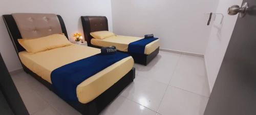 Ένα ή περισσότερα κρεβάτια σε δωμάτιο στο Afna Home stay