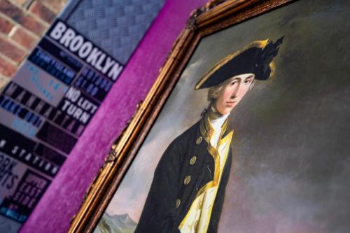 a painting of a woman wearing a graduation hat at Albert's Rest in Ramsgate