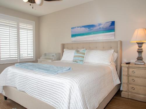 En eller flere senge i et værelse på Belle Harbor 805W A Clearwater Beach Gem