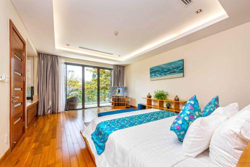 Letto o letti in una camera di Daisy Ocean Villa Da Nang