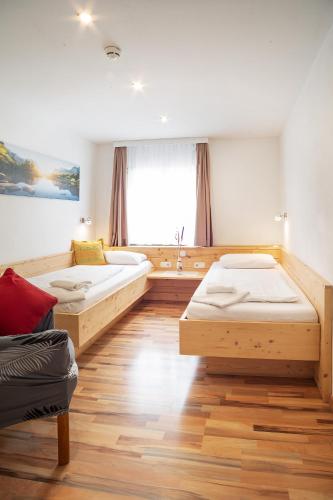 Cama o camas de una habitación en Hotel Gisela