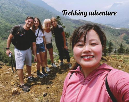 a group of people standing on top of a mountain at Surelee Homestay in Sa Pa