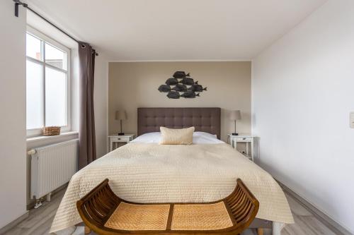 Postel nebo postele na pokoji v ubytování Witt Hus