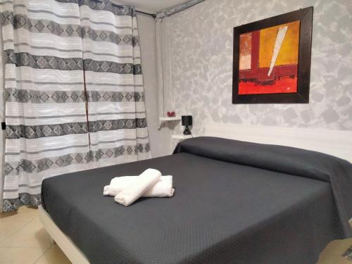 Cama o camas de una habitación en Cusano Home