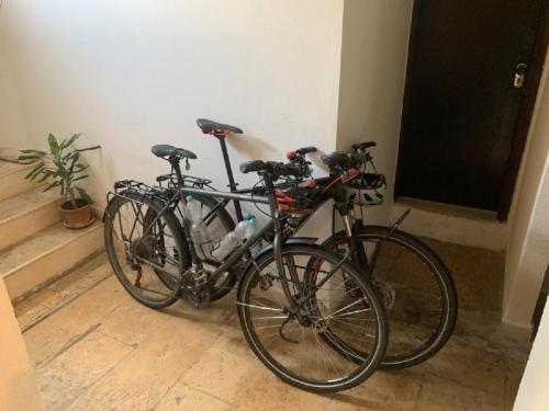 two bikes parked next to each other in a room at Rooms Garden in Dubrovnik
