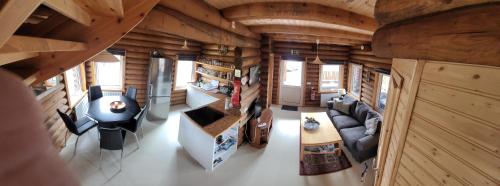 an overhead view of a living room and kitchen in a log cabin at Akureyri Log Cabin in Akureyri