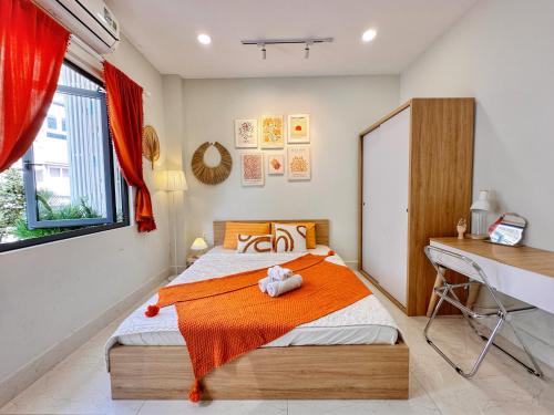 Postelja oz. postelje v sobi nastanitve LalaHouse Spring Apartment - Saigon Center