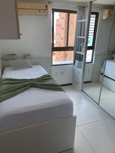 Luxor Tambaú Beach Paradiseにあるベッド