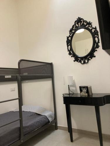 Postel nebo postele na pokoji v ubytování Garden Suite