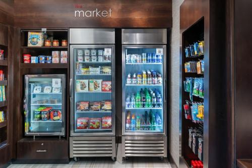 two refrigerators in a store with food and drinks at Residence Inn by Marriott Anaheim Brea in Brea