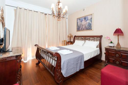 Ένα ή περισσότερα κρεβάτια σε δωμάτιο στο Cape Serenity Mansion