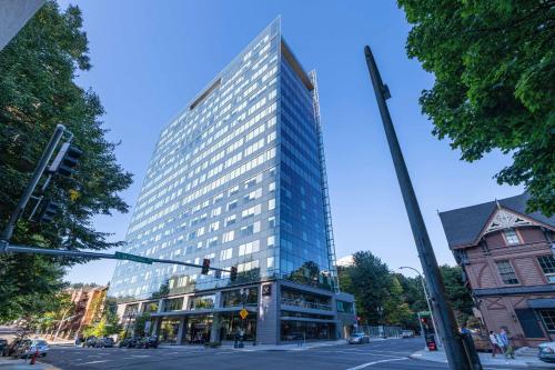 a tall building on a city street with a traffic light at Hotel Vance, Portland, a Tribute Portfolio Hotel in Portland