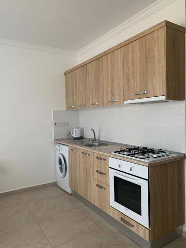 Η κουζίνα ή μικρή κουζίνα στο Park Residence,Studio,Sea View Long Beach, Iskele