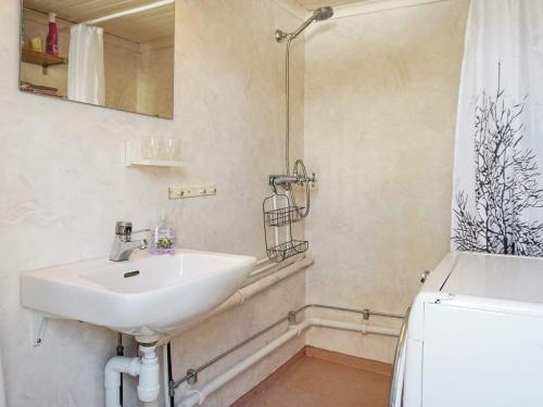 a bathroom with a sink and a toilet at 4 person holiday home in Fjällbacka-By Traum in Fjällbacka