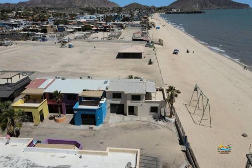 an aerial view of a beach with houses and the ocean at InTown Beach front condo - Casey`s condo 1 in San Felipe