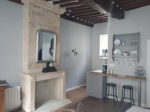Kuchyňa alebo kuchynka v ubytovaní Authentique studio au cœur de Bayeux