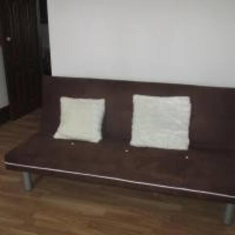 Ruang duduk di Quarto & Pasta Guesthouse