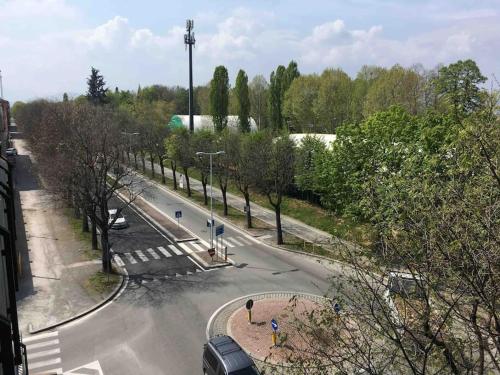 an overhead view of a street with trees and a road at Residenza Monviso in Cuneo